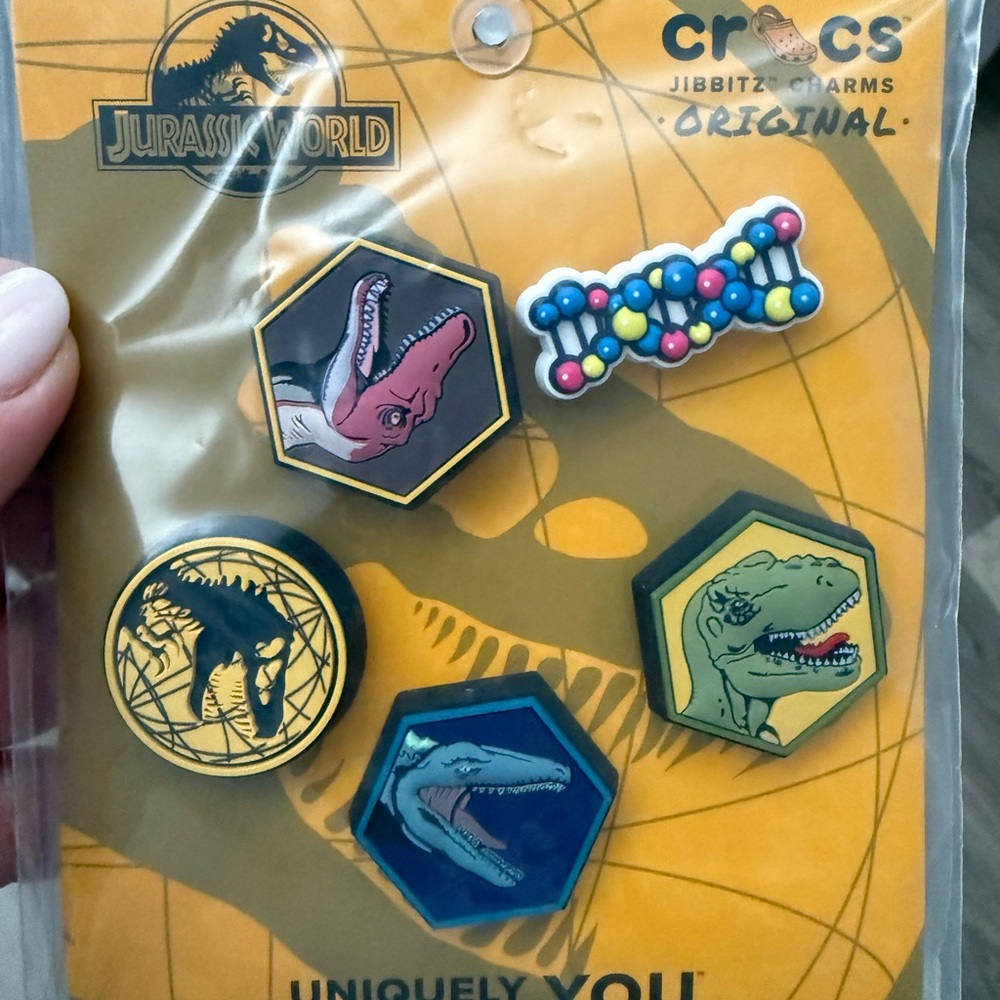 CROCS Jurassic World Dino Jibbitz Charm Pack - Yellow, Blue, Green, Pink